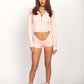 MOCHI LIQUID MESH V-BACK MINI SHORTS